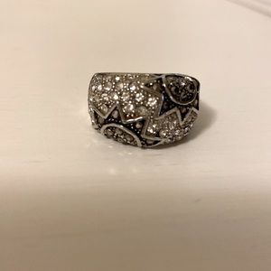 Silver ring with white and black zircon stones